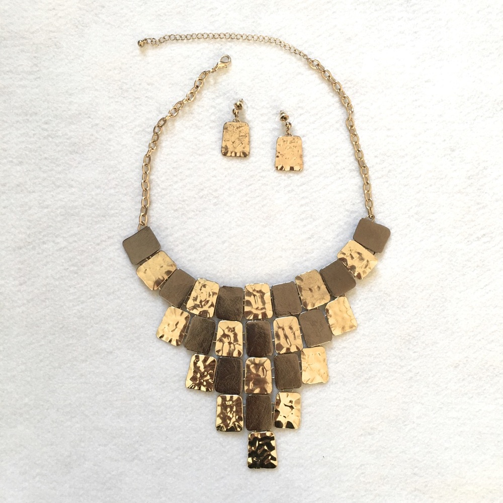 Gold-gunmetal statement necklace matching earrings